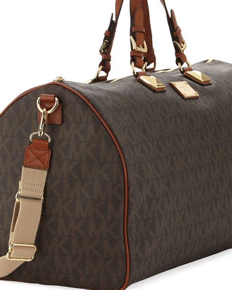 michael kors jet set travel logo duffle bag|michael kors saffiano jet set.